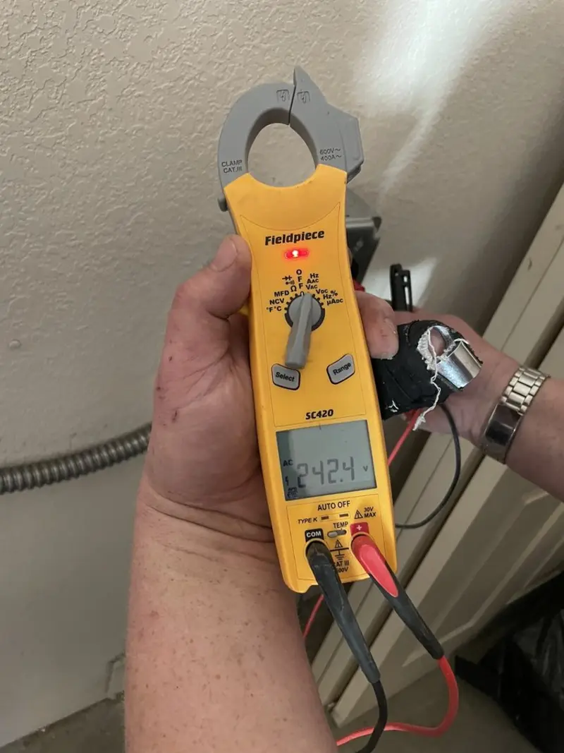 Voltage testing with clamp meter during Outlet Installation in Sherwood